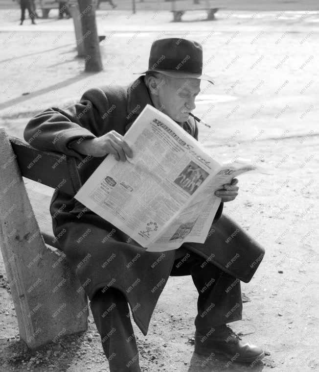 City Photo-Genre Photo - Man Reading a Newspaper 